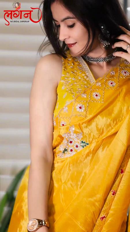 A mustard saree with floral embroidery