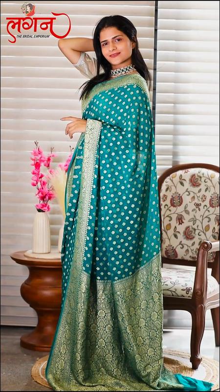 A teal banarasi saree
