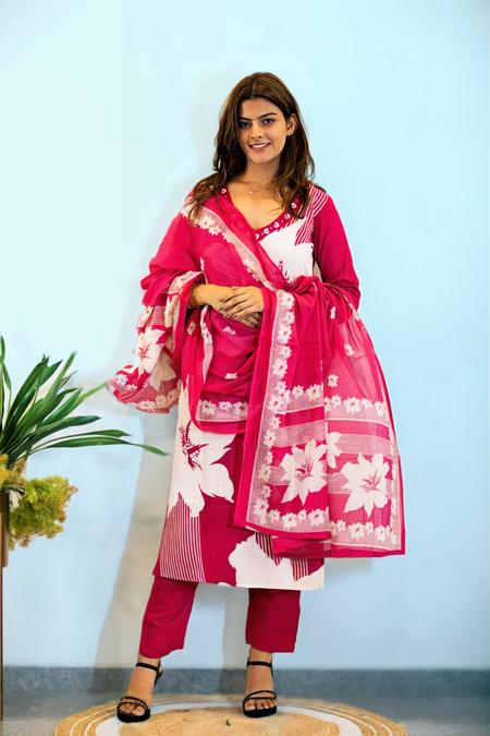 A pink and white printed suit